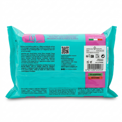 Reverso del empaque de toallitas Salviette Detergenti con clorhexidina, mostrando las instrucciones de limpieza antiséptica para mascotas.